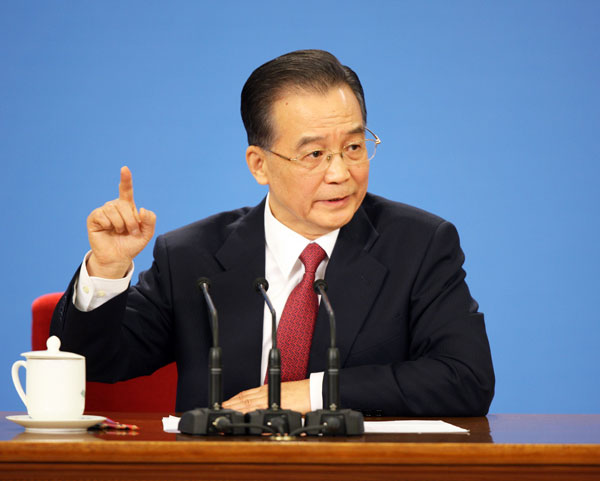 3月13日,国务院总理温家宝在北京人民大会堂与中外记者见面,并回答记者提问。